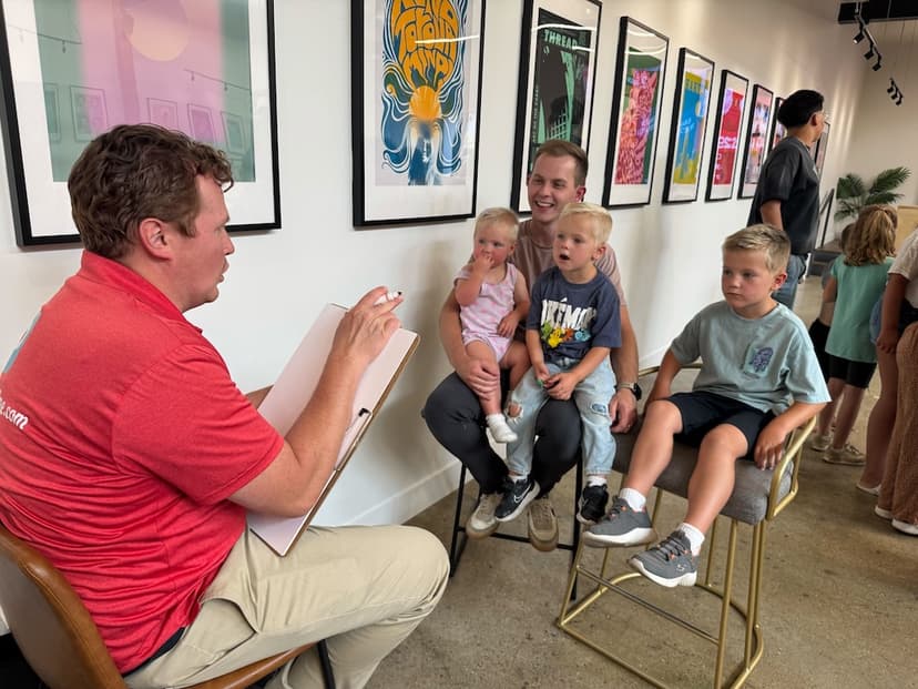 Zach drawing with his kids